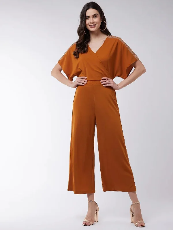 women's jumpsuits for laid-back looksPANNKH Mustard Solid Overlap Embellished Jumpsuit